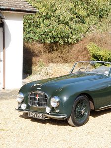 Preview wallpaper aston martin, 1952, black, front view, style, cars, retro, nature, house, trees, shrubs