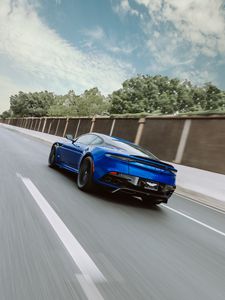 Preview wallpaper aston martin, car, sports, blue, road, speed, movement