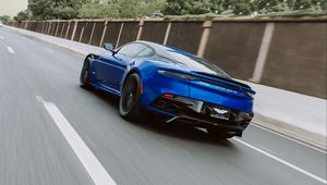 Preview wallpaper aston martin, car, sports, blue, road, speed, movement