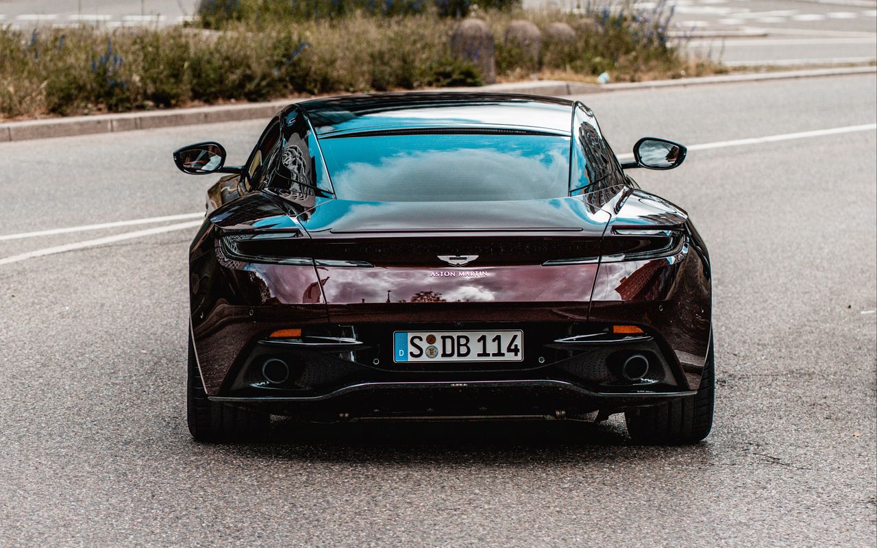 1280x800 Wallpaper aston martin, car, sports car, red, road