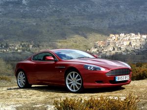 Preview wallpaper aston martin, db9, 2004, red, side view, style, cars, nature, trees, houses