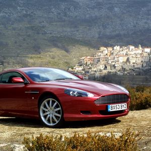 Preview wallpaper aston martin, db9, 2004, red, side view, style, cars, nature, trees, houses