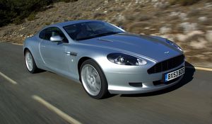 Preview wallpaper aston martin, db9, 2004, silver metallic, side view, style, cars, speed, nature, trees, asphalt