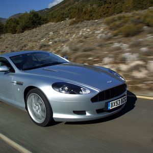 Preview wallpaper aston martin, db9, 2004, silver metallic, side view, style, cars, speed, nature, trees, asphalt