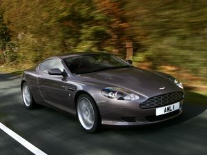 Preview wallpaper aston martin, db9, 2004, gray side view, style, cars, speed, trees, asphalt