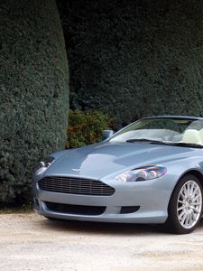 Preview wallpaper aston martin, db9, 2004, blue, side view, style, cars, nature, shrubs, trees