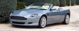 Preview wallpaper aston martin, db9, 2004, blue, side view, style, cars, nature, shrubs, trees