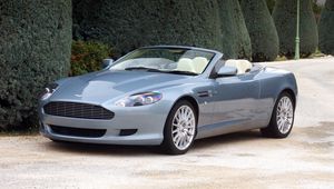 Preview wallpaper aston martin, db9, 2004, blue, side view, style, cars, nature, shrubs, trees