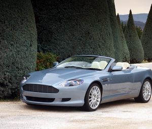 Preview wallpaper aston martin, db9, 2004, blue, side view, style, cars, nature, shrubs, trees