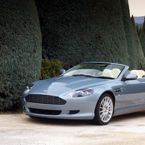 Preview wallpaper aston martin, db9, 2004, blue, side view, style, cars, nature, shrubs, trees