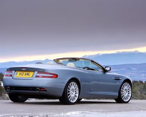 Preview wallpaper aston martin, db9, 2004, blue, side view, style, cars, nature, mountains