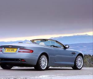 Preview wallpaper aston martin, db9, 2004, blue, side view, style, cars, nature, mountains