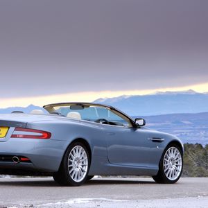 Preview wallpaper aston martin, db9, 2004, blue, side view, style, cars, nature, mountains