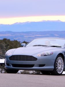 Preview wallpaper aston martin, db9, 2004, blue, front view, style, cars, nature, mountains, trees