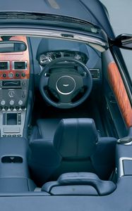 Preview wallpaper aston martin, db9, 2004, black, salon, interior, steering wheel, speedometer