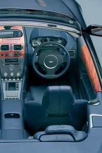 Preview wallpaper aston martin, db9, 2004, black, salon, interior, steering wheel, speedometer