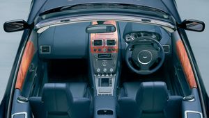 Preview wallpaper aston martin, db9, 2004, black, salon, interior, steering wheel, speedometer