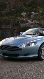 Preview wallpaper aston martin, db9, 2004, blue, side view, style, cars, nature, grass, asphalt