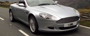 Preview wallpaper aston martin, db9, 2004, silver metallic, side view, style, sports, cars, speed, nature, mountains