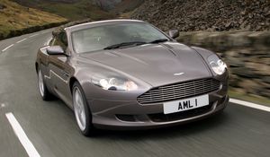 Preview wallpaper aston martin, db9, 2004, gray, front view, style, cars, speed, mountains, asphalt