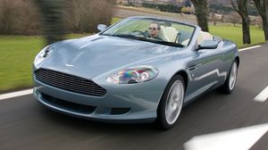 Preview wallpaper aston martin, db9, 2004, blue, front view, cars, speed, trees, nature