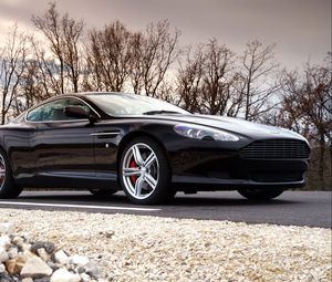 Preview wallpaper aston martin, db9, 2006, black, side view, style, cars, sports, trees, sky