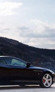 Preview wallpaper aston martin, db9, 2006, black, side view, style, cars, sports, nature, sky, mountains, trees