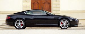 Preview wallpaper aston martin, db9, 2006, black, side view, sports, style, cars, building