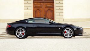 Preview wallpaper aston martin, db9, 2006, black, side view, sports, style, cars, building