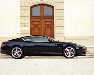 Preview wallpaper aston martin, db9, 2006, black, side view, sports, style, cars, building