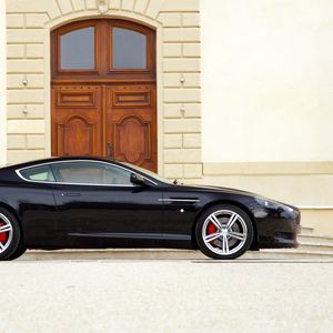 Preview wallpaper aston martin, db9, 2006, black, side view, sports, style, cars, building