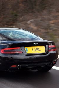 Preview wallpaper aston martin, db9, 2006, black, rear view, style, cars, speed, nature, trees