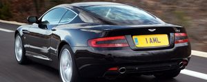 Preview wallpaper aston martin, db9, 2006, black, rear view, style, cars, speed, nature, trees