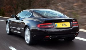 Preview wallpaper aston martin, db9, 2006, black, rear view, style, cars, speed, nature, trees