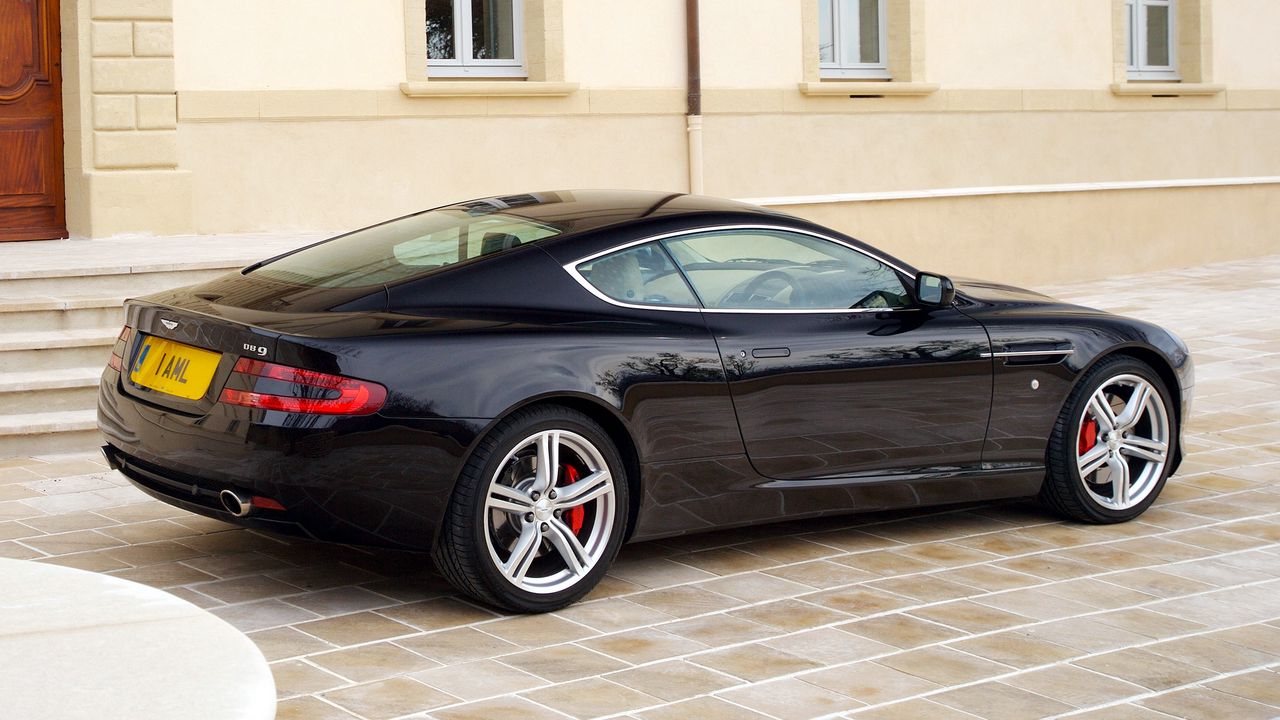 Wallpaper aston martin, db9, 2006, black, side view, style, cars, sports, building