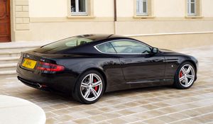 Preview wallpaper aston martin, db9, 2006, black, side view, style, cars, sports, building