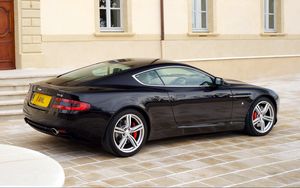 Preview wallpaper aston martin, db9, 2006, black, side view, style, cars, sports, building