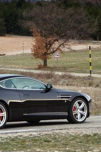 Preview wallpaper aston martin, db9, 2006, black, side view, style, sports, cars, nature, trees