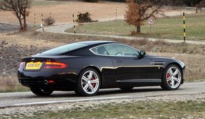 Preview wallpaper aston martin, db9, 2006, black, side view, style, sports, cars, nature, trees