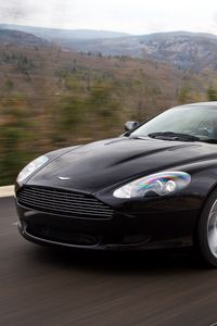 Preview wallpaper aston martin, db9, 2006, black, side view, style, sports, cars, speed, mountains, trees, nature, asphalt