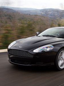 Preview wallpaper aston martin, db9, 2006, black, side view, style, sports, cars, speed, mountains, trees, nature, asphalt