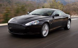 Preview wallpaper aston martin, db9, 2006, black, side view, style, sports, cars, speed, mountains, trees, nature, asphalt