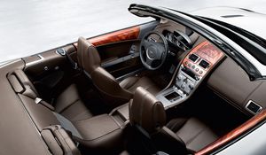 Preview wallpaper aston martin, db9, 2008, brown, top view, salon, interior, steering wheel, speedometer