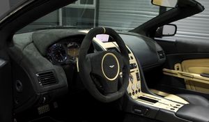 Preview wallpaper aston martin, db9, 2009, black, salon, interior, steering wheel, speedometer