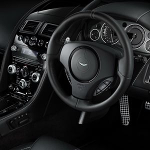 Preview wallpaper aston martin, db9, 2010, black, salon, interior, steering wheel, speedometer