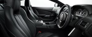 Preview wallpaper aston martin, db9, 2010, black, salon, interior, steering wheel, speedometer