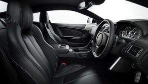 Preview wallpaper aston martin, db9, 2010, black, salon, interior, steering wheel, speedometer