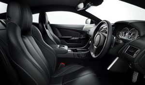 Preview wallpaper aston martin, db9, 2010, black, salon, interior, steering wheel, speedometer