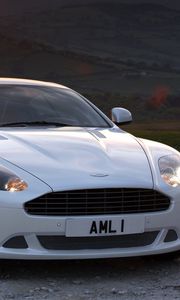 Preview wallpaper aston martin, db9, 2010, white, front view, style, sports, cars, nature, sunset, trees, grass