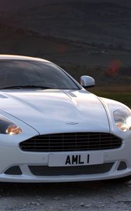 Preview wallpaper aston martin, db9, 2010, white, front view, style, sports, cars, nature, sunset, trees, grass